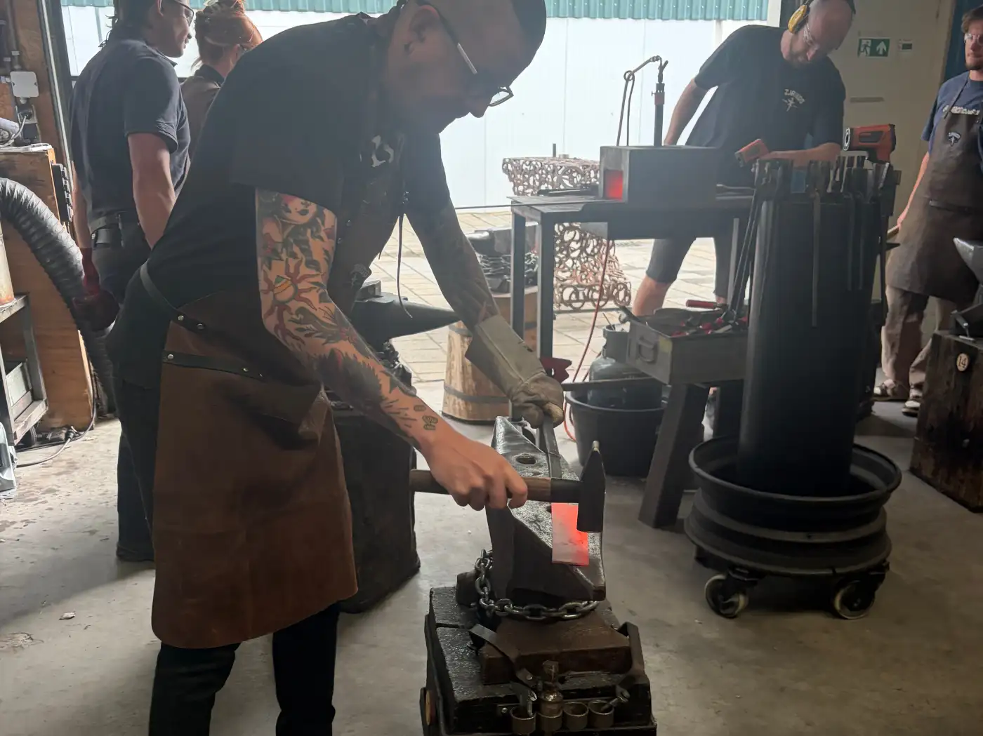 Me hammering steel into a knife